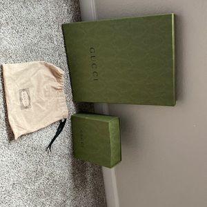 Authentic empty Gucci boxes and a authentic Gucci belt bag cover.